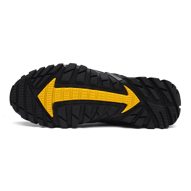 Durable rubber outsole of men's camping sports sneakers with yellow traction design, offering grip for outdoor activities - Model SF0827.